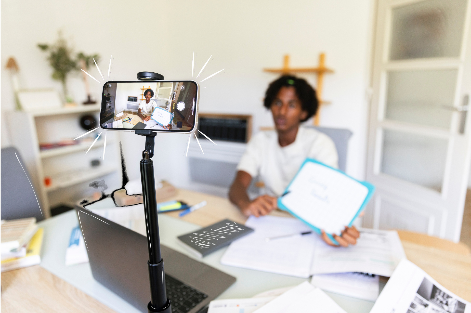 A professor teaching via a video call, demonstrating how digital tools support education and economic development.